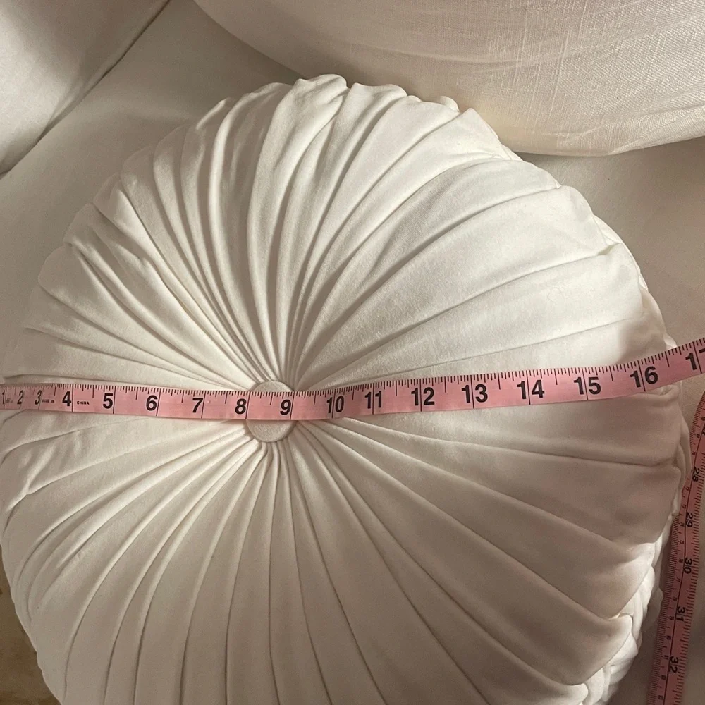 Round white velvet tufted pillow